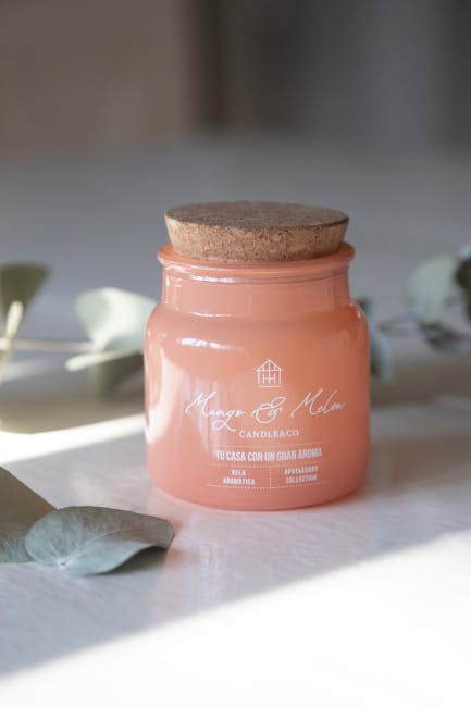 Vela aromática de mango y melón en tarro con tapa de corcho