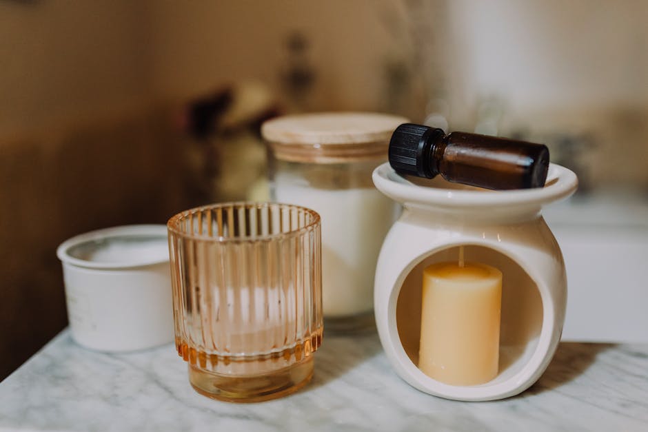 Conjunto de aromaterapia con velas, tarros y aceites esenciales